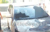 Parked car set ablaze by miscreants in Kasargod